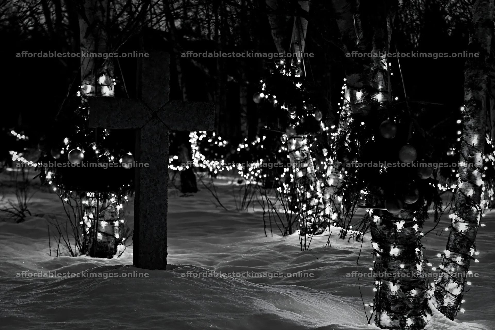 Stone Christian cross in snowy meadow with lights – stock images 9722x6480