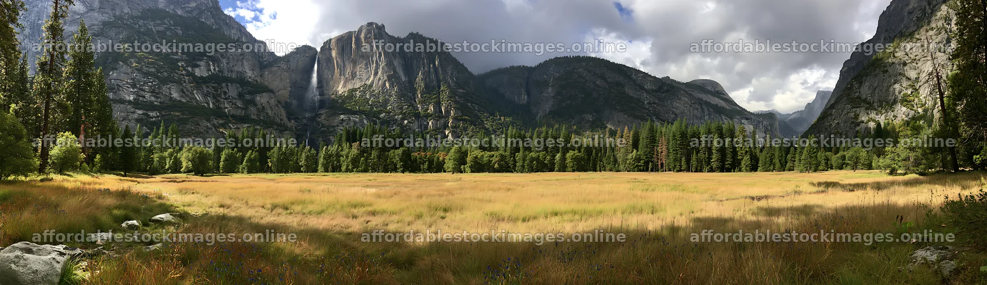 Alpine meadow with waterfall and mountains in background – stock images 14762x4268