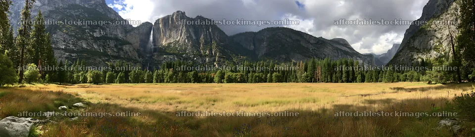 Alpine meadow with waterfall and mountains in background – stock images 14762x4268