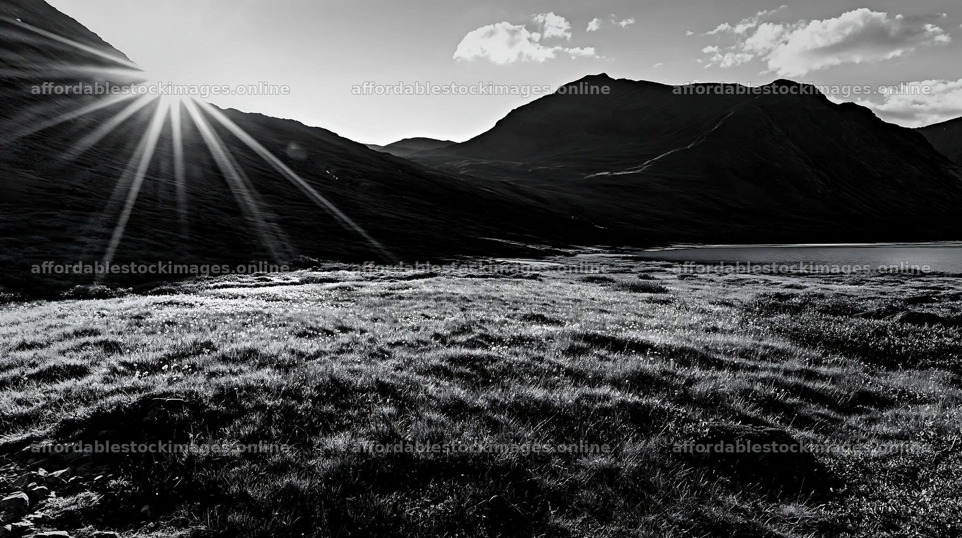 Sunbeams shining over Jotunheimen valley meadow in Norway – stock images 10608x5938
