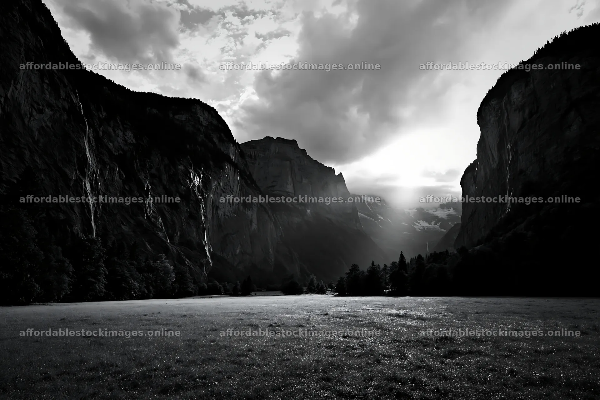 Lauterbrunnen Valley meadow light rays create dramatic landscape – stock images 9722x6480