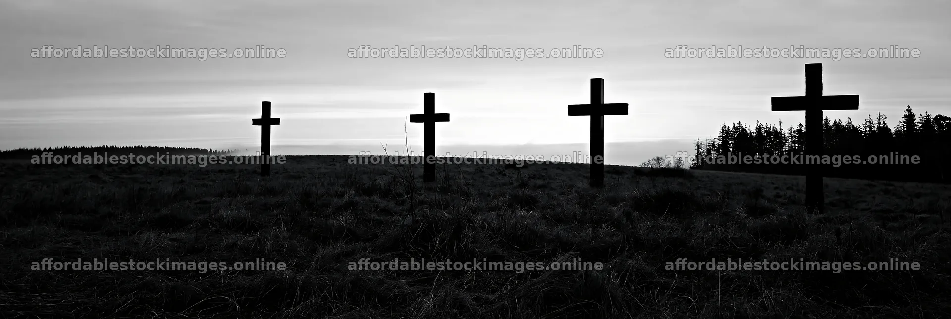 Four Christian crosses in a winter meadow at dusk – stock images 13690x4602