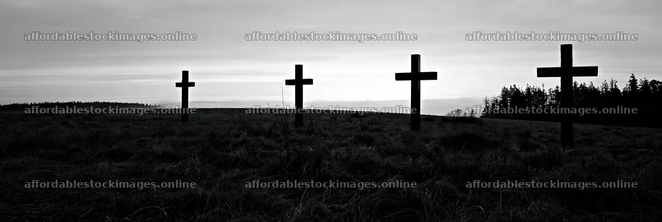 Four Christian crosses in a winter meadow at dusk – stock images 13690x4602