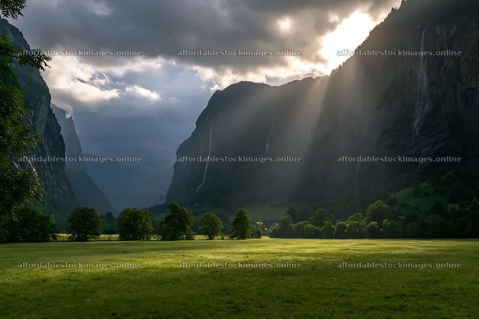 Lauterbrunnen Valley meadow light rays create dramatic scenery – stock images 9722x6480