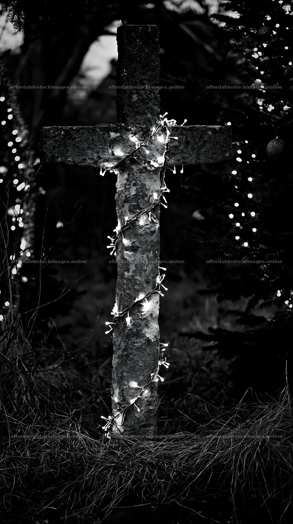 Handcrafted Christian cross in meadow with Christmas lights – stock images 5938x10608